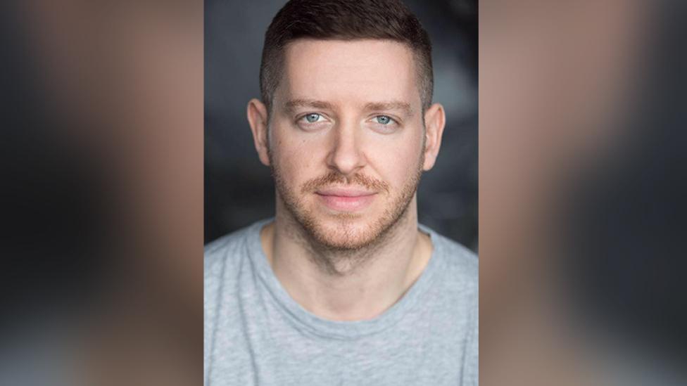 A headshot of Geraint Rhys Edwards