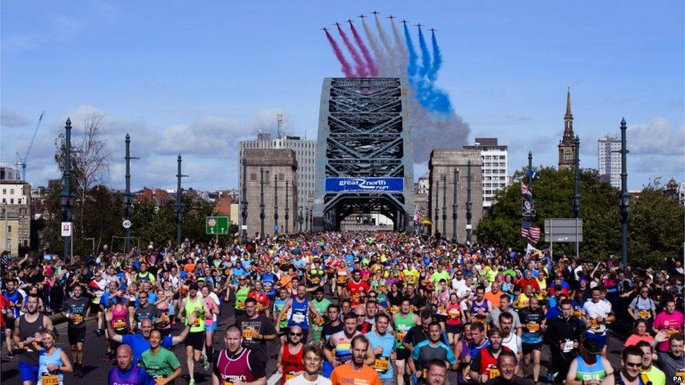 Runners crossing the Tyne Bridge