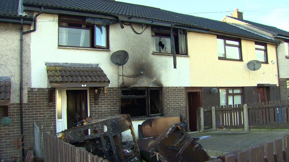 The exterior of the fire-damaged house