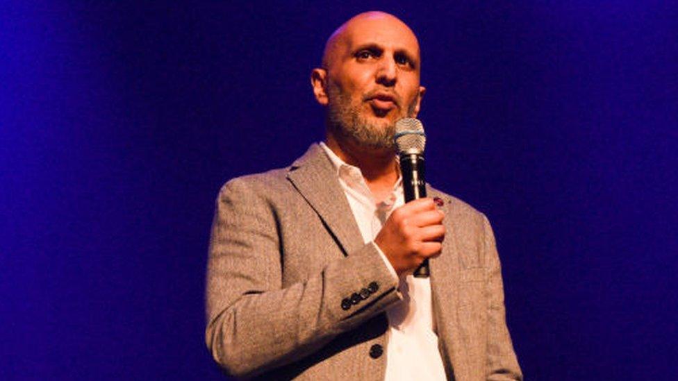 DEC Chief Executive Saleh Saeed on stage at the charity fundraiser "Night For Ukraine" at The Roundhouse