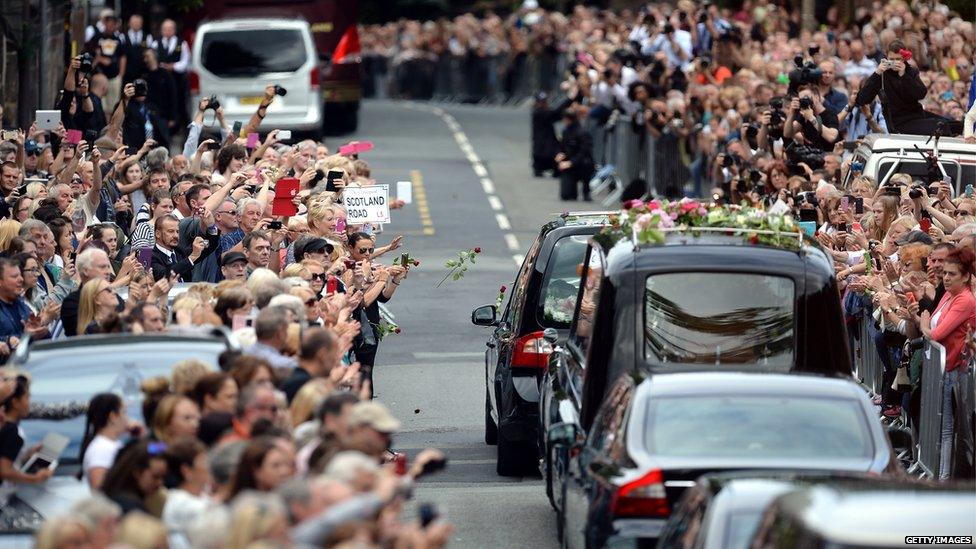 The funeral cortege arrives at St Mary's Church, Woolton