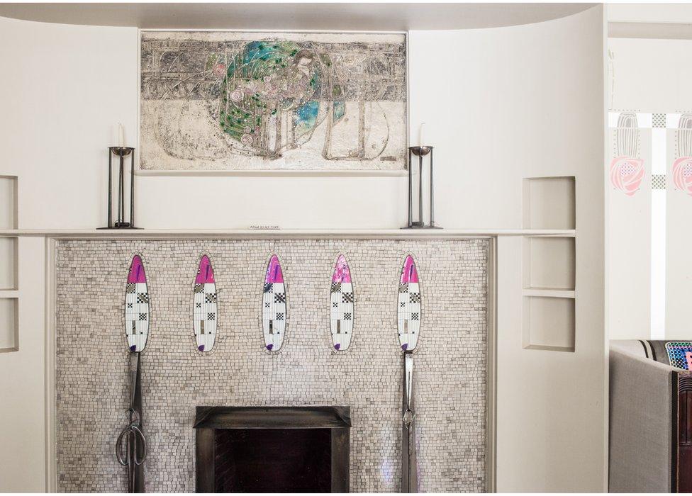 A gesso panel by Mackintosh's wife Margaret Macdonald features above the fireplace at Hill House