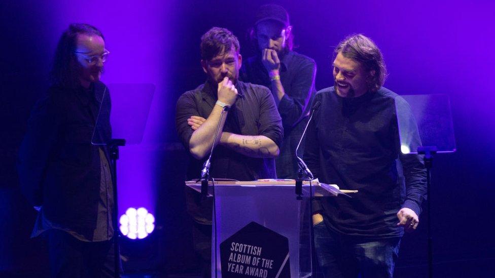 Grant Hutchinson of Frightened Rabbit receives the Modern Scottish Classic Award for "The Midnight Organ Fight" album during the Scottish Album Of The Year Award Ceremony