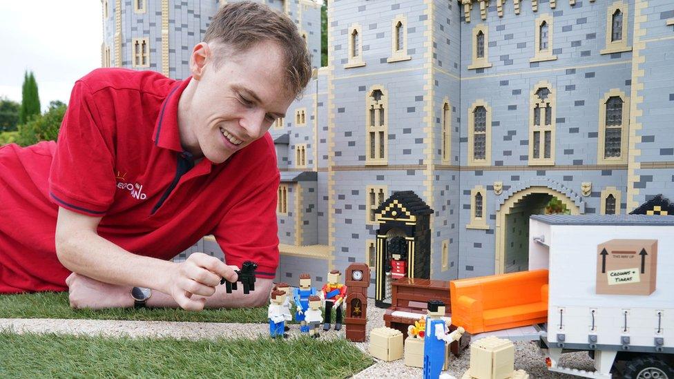 Legoland model maker Will Metcalfe with the display