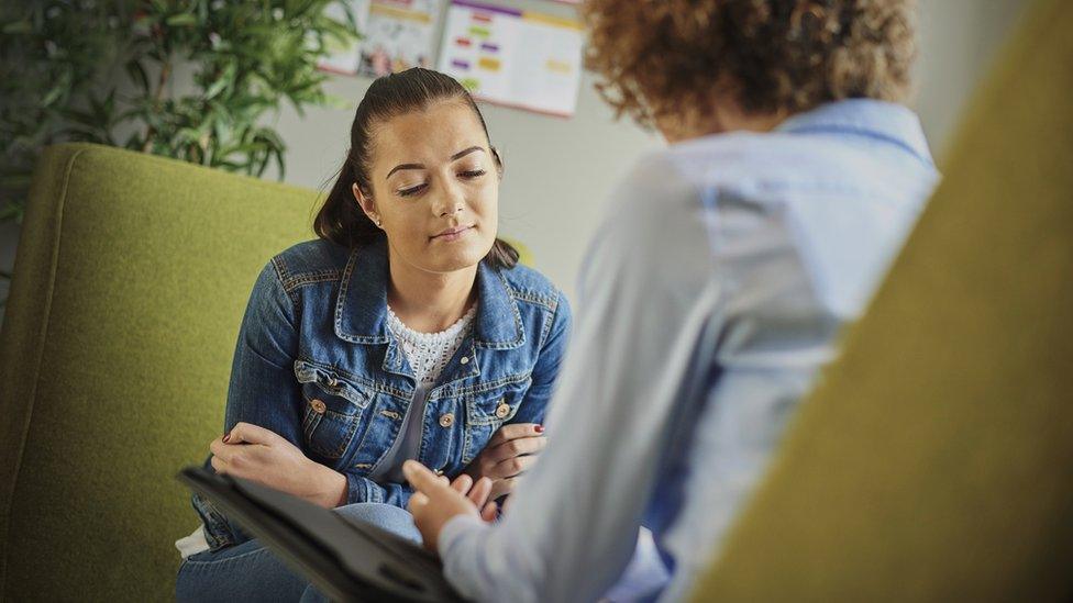 Woman talking about her mental health issues