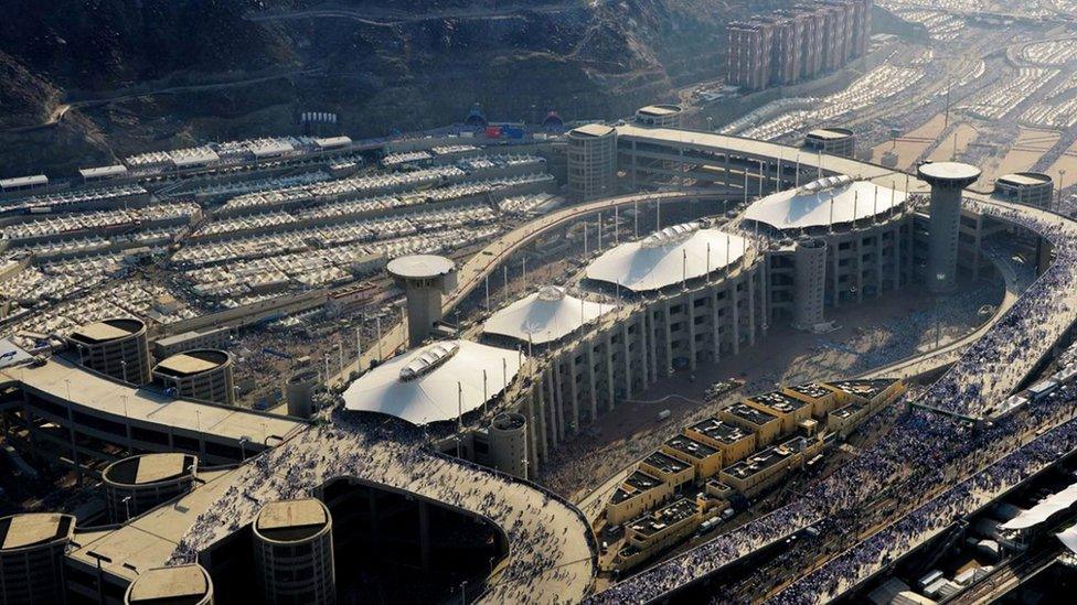 Millions of pilgrims make their way over the Jamarat Bridge to cast stones at pillars representing the devil (24 September 2015)