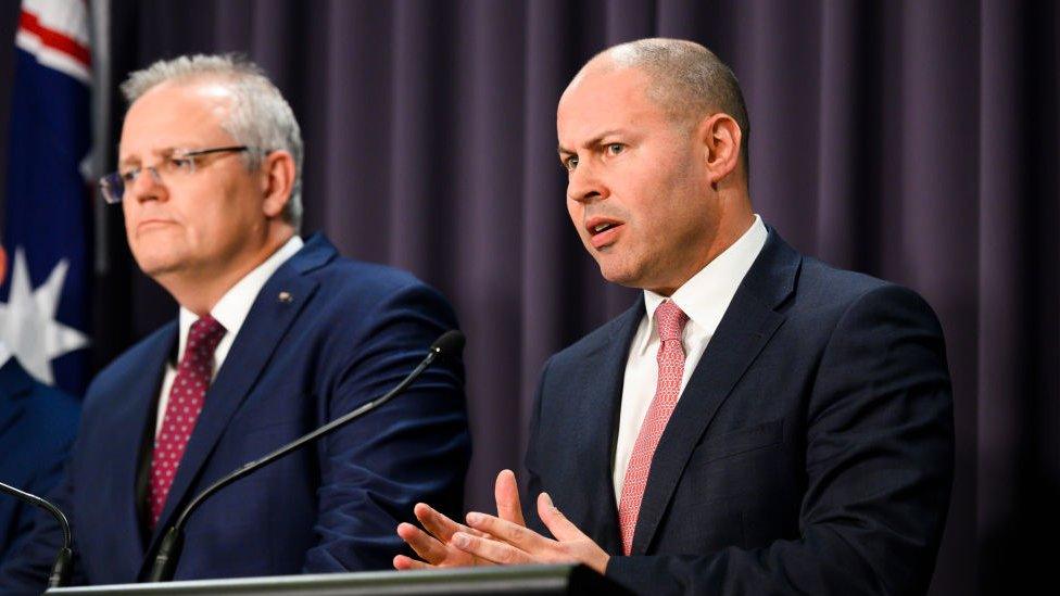 Treasurer Josh Frydenberg speaks alongside Prime Minister Scott Morrison