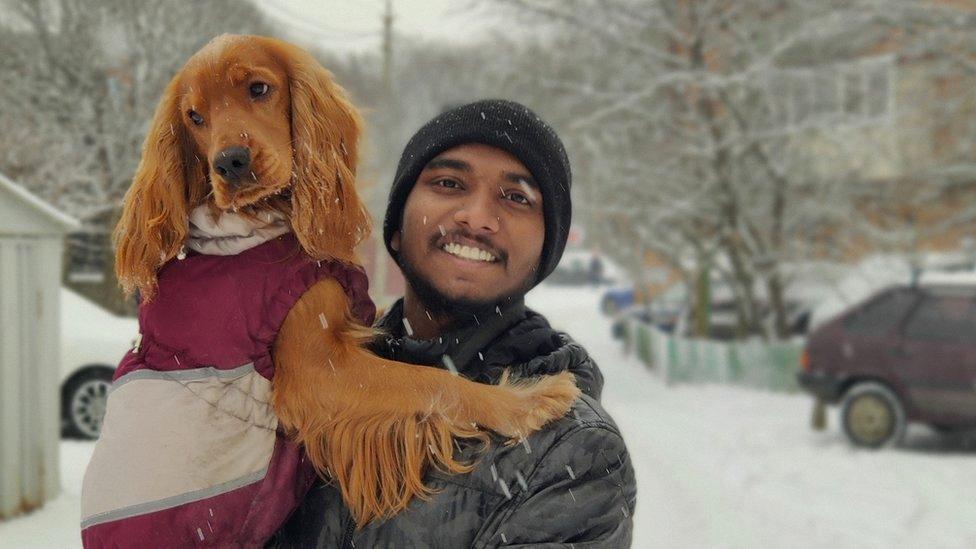 Vishnu with his dog Leo