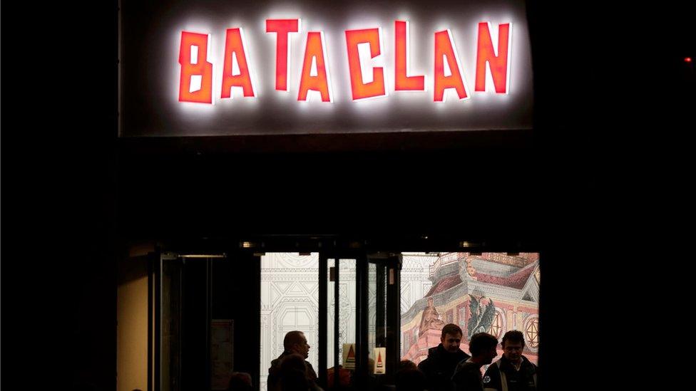 People start to arrive at the Bataclan on Saturday, 12 November