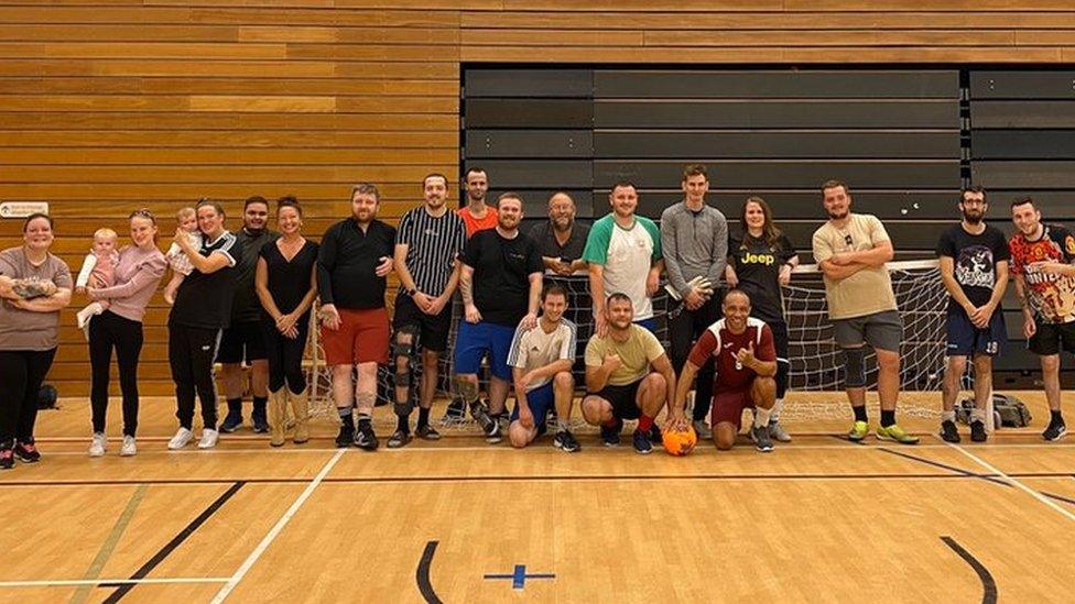 Group picture of the mental health football session in Swansea