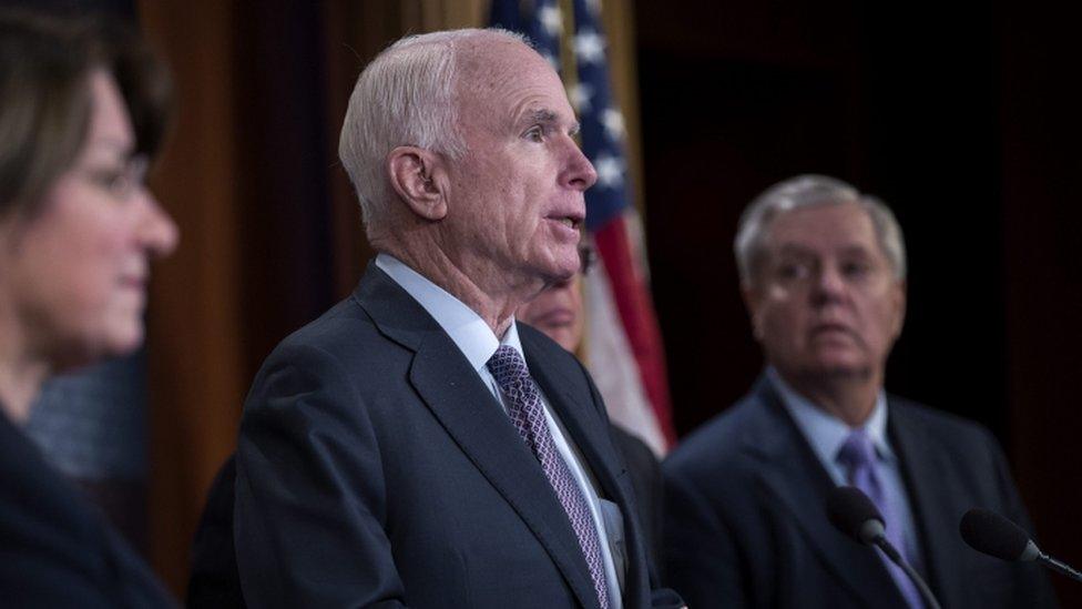 US Republican Senator from Arizona John McCain delivers remarks during a press conference in the US Capitol in Washington, DC, 10 January 2017 about sanctions against Russia for their computer hacking interference in the US Presidential election.