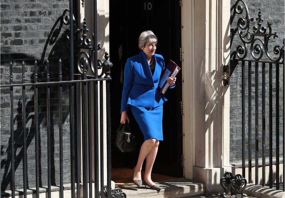 Theresa May leaves Downing Street