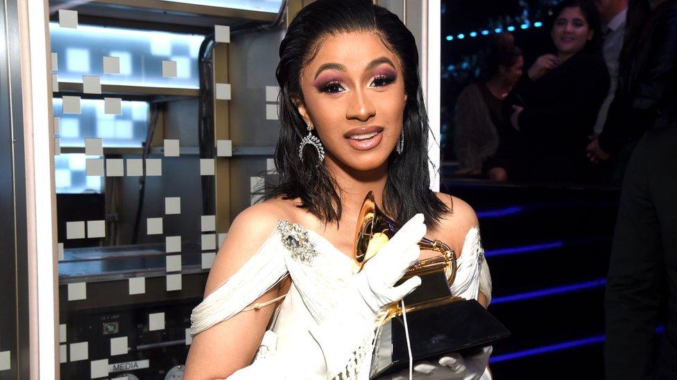 Cardi B with her Grammy award