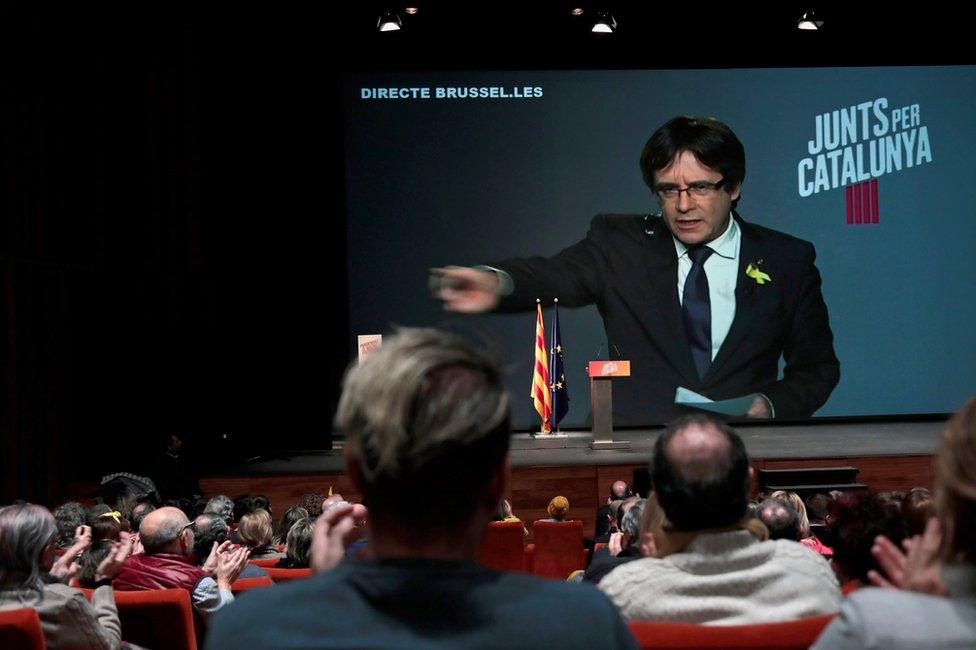 Carles Puigdemont addresses his party in Barcelona in a video conference from Brussels, 12 December