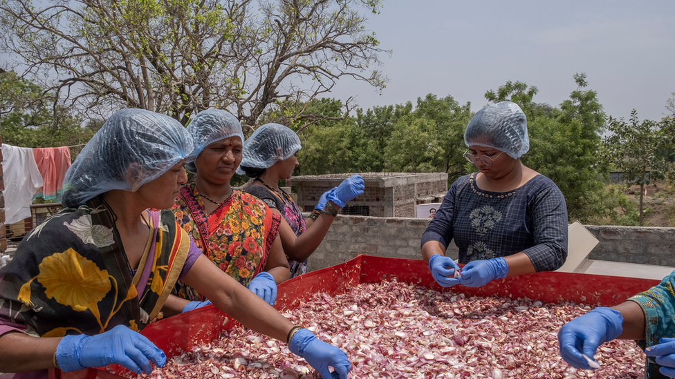 Women using S4S Technologies equipment.