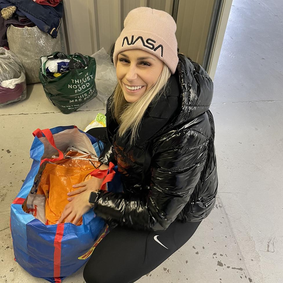 Roksana, the Polish coordinator, packing donated goods