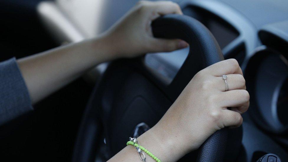 Woman driving a car