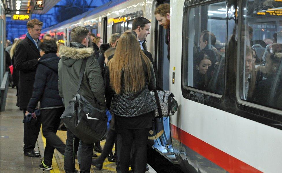 People getting on a train