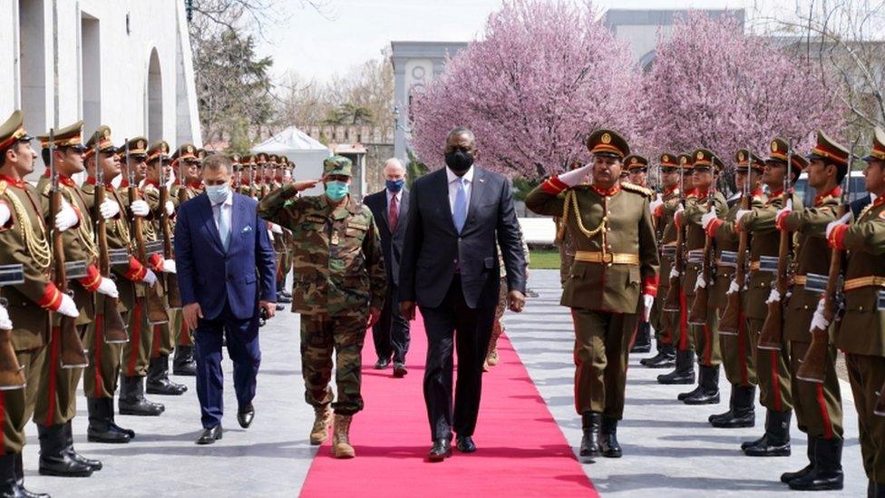 US Defence Secretary Lloyd Austin (C) in Kabul