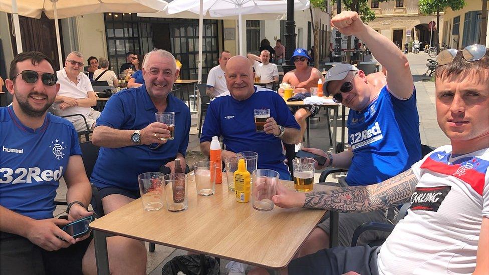 Rangers fans at a bar in Seville