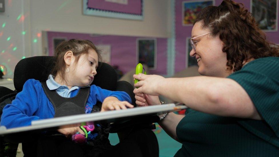 Teacher Leigh Wharton with a pupil