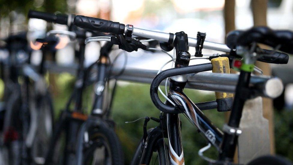 Bikes secured on a city rack