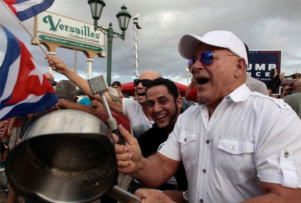 People celebrate after the death of Cuban revolutionary leader Fidel Castro, in the Little Havana district of Miami, Florida on 26 November, 2016.