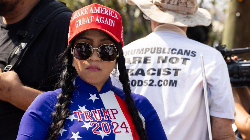 Supporters of former President Donald Trump gather outside Fulton County Jail ahead of Trump's surrender on 24 August 2023 in Atlanta, Georgia.