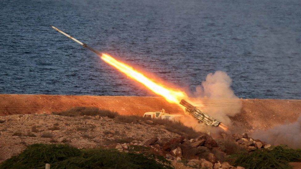 A missile is launched during an Iranian military exercise called the "Great Prophet 17", in south-west Iran (22 December 2021)