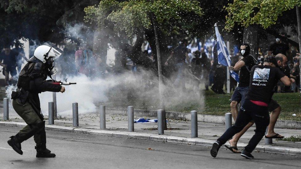 Protesters clash with police during a demonstration in Thessaloniki against the agreement reached by Greece and Macedonia to resolve a dispute over the former Yugoslav republic's name, 8 September 2018