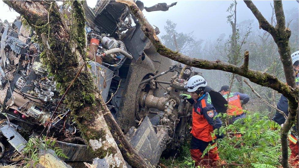 Rescuers at the scene of the emergency landing