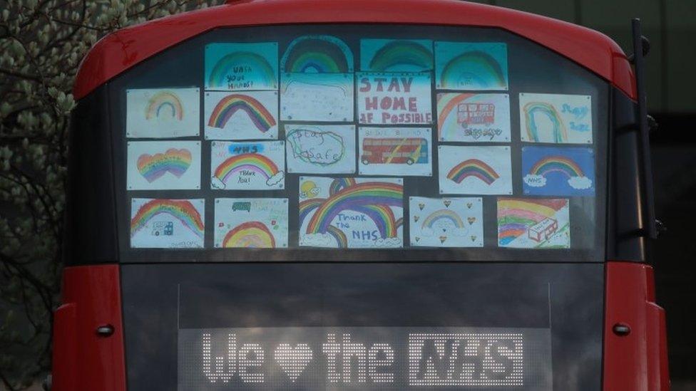 A double decker bus is decorated in support of the NHS at the Freeman Hospital in Newcastle upon Tyne, to salute local heroes during Thursday's nationwide Clap for Carers initiative to recognise and support NHS workers fighting the coronavirus pandemic