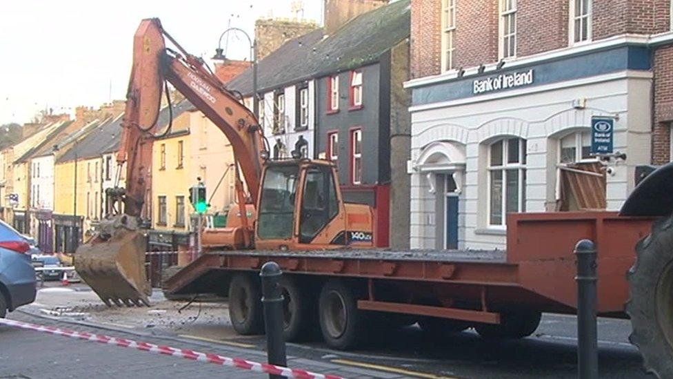 A digger at the scene of the robbery