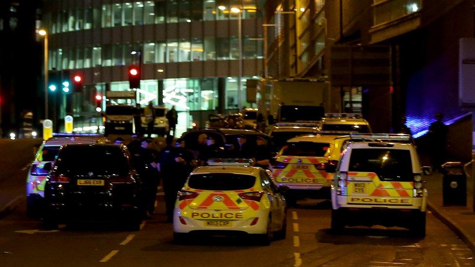 Police cars outside the arena on the night of the attack