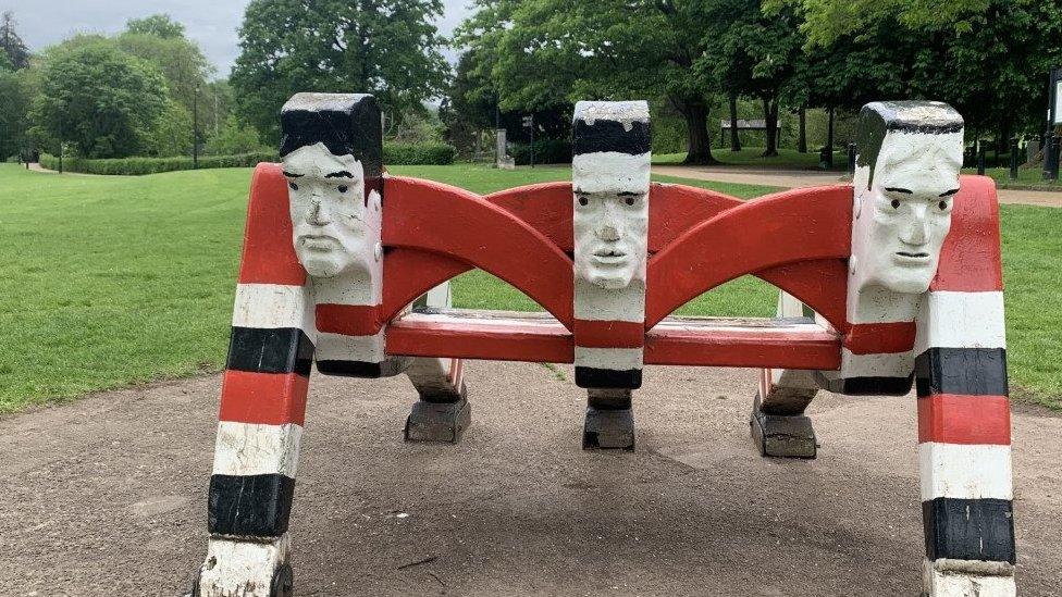 Sculpture of the Pontypool front row in Pontypool Park