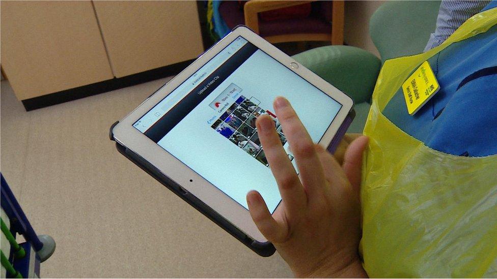 Nurse with a tablet