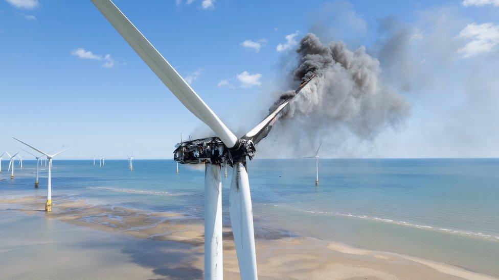 Smoke billowing from a wind turbine off the coast of Great Yarmouth