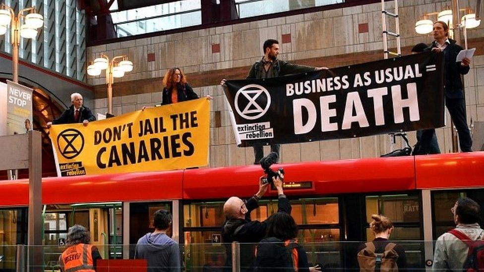 Protesters on DLR train