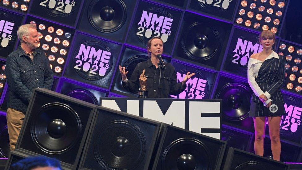 Emily Eavis picking up the Godlike Genius award at the NME Awards