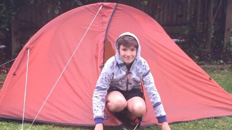 Max outside his tent.