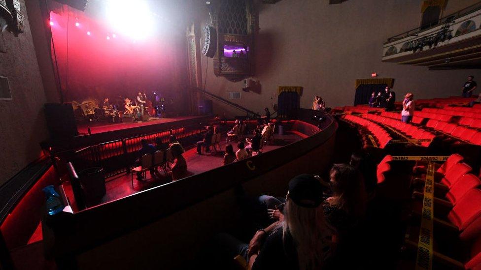 Large areas of the auditorium were left empty