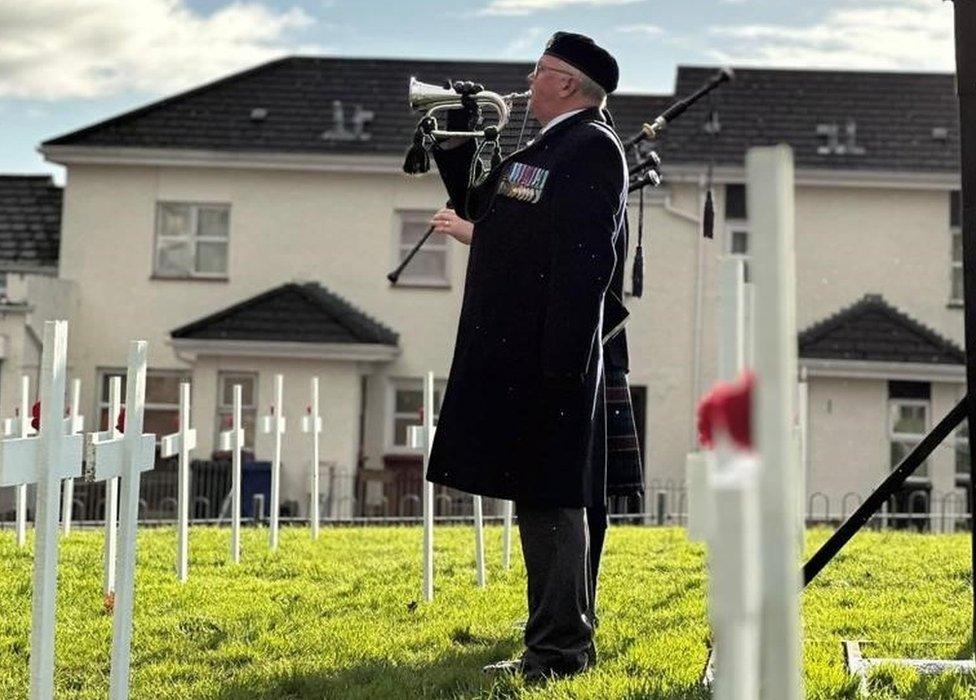 Remembrance service in Derry with 100 white crosses