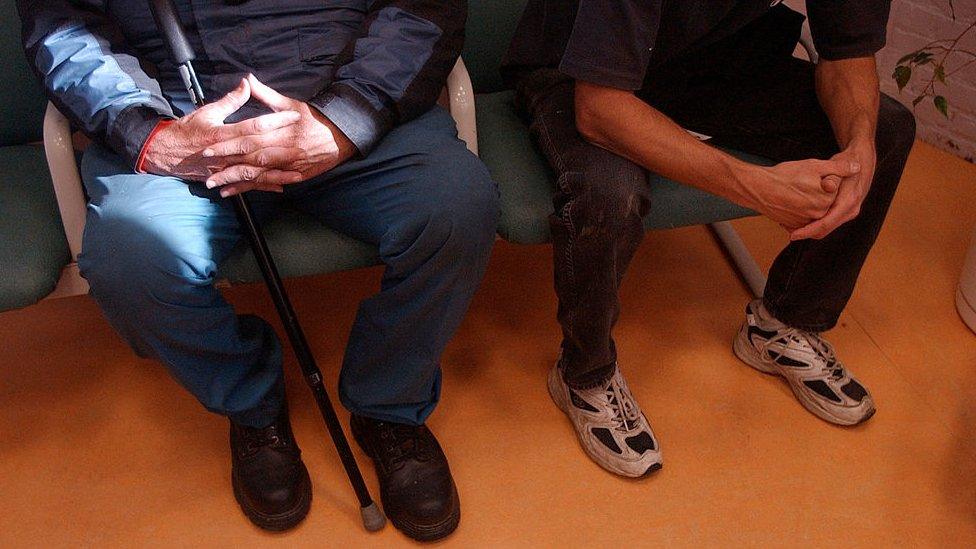 Patients wait in the waiting room to see physician