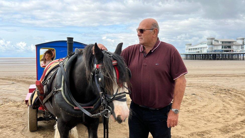 Kevin Magor with horse and carriage on beach