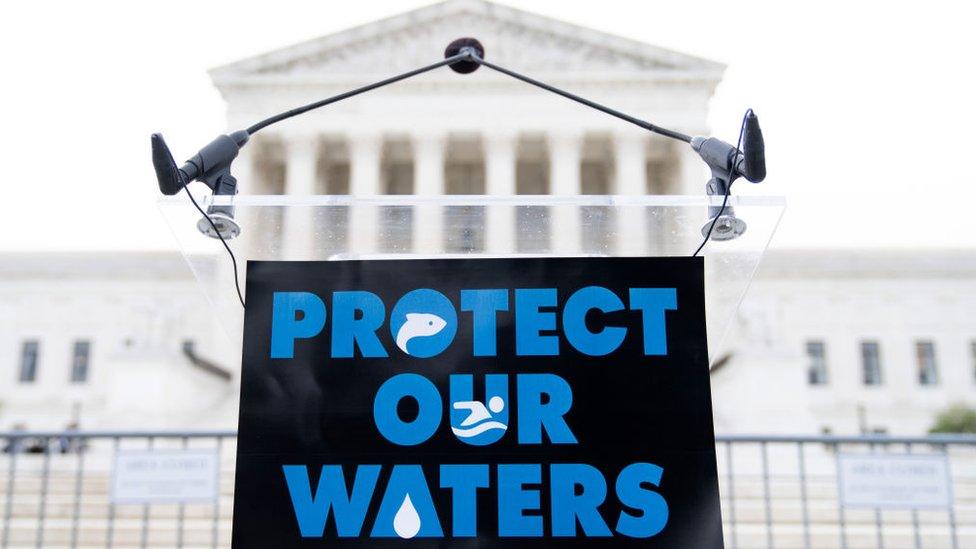 A rally sign for Clean Water Act outside of Supreme Court