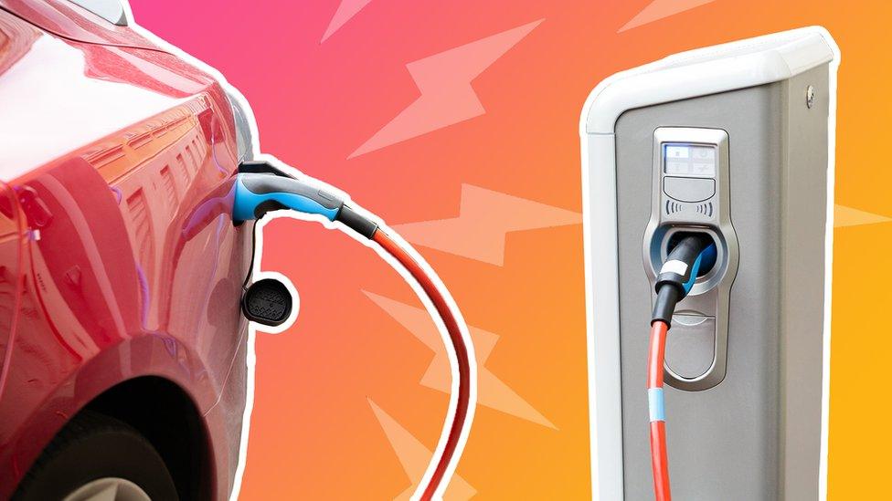 An illustration shows lightening bolts leaping from an electric car plugged in to charge, against the background of sunset colours