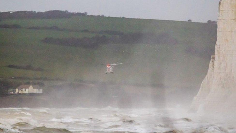 A HM Coastguard helicopter over choppy seas