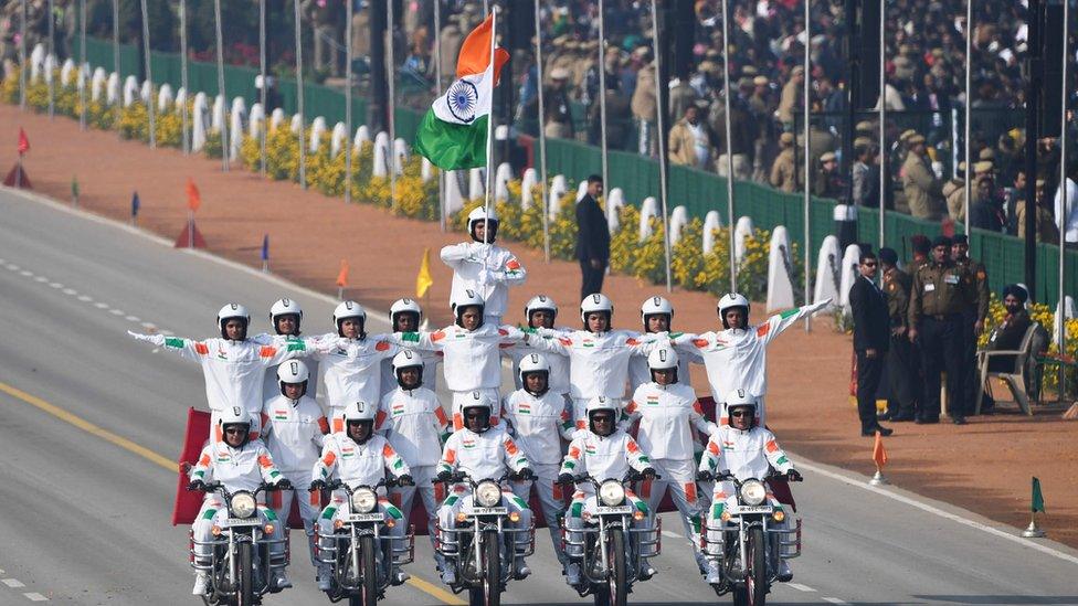 Central Reserve Police Force (CRPF) women motorcycle team members perform during the Republic Day parade in New Delhi on 26 January 2020.