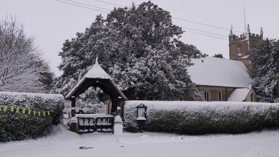 Broad Hinton Church in Wiltshire with snow