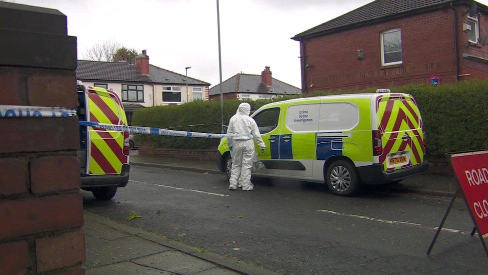 Forensic officers at scene of stabbing